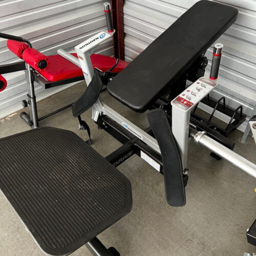 Nautilus glute drive w/ weight plate holder